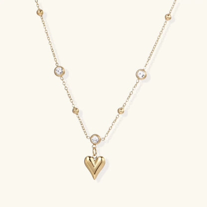 Crystal Heart Charm Necklace by Aurora Beauty