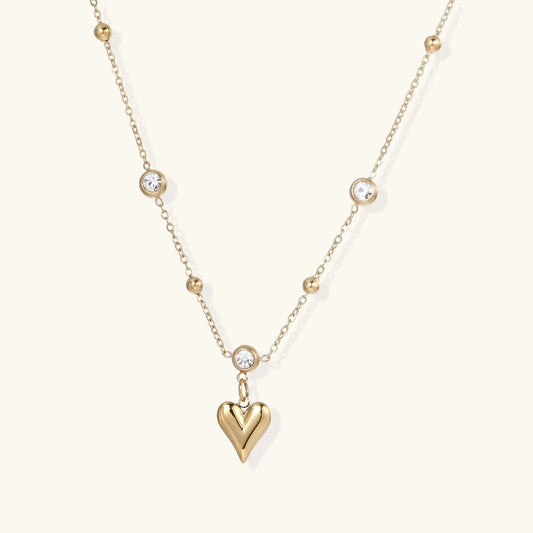 Crystal Heart Charm Necklace by Aurora Beauty