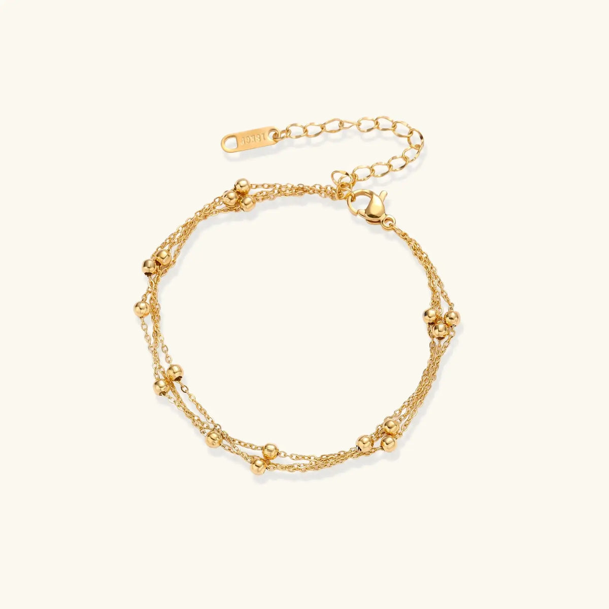 Golden Orbit Bracelet by Aurora Beauty