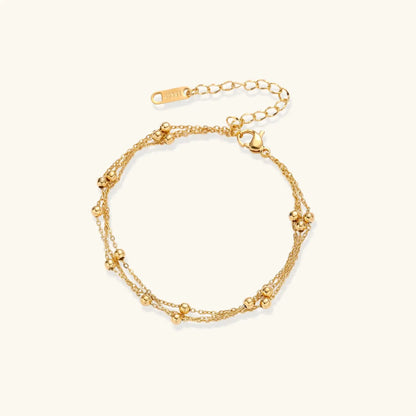 Golden Orbit Bracelet by Aurora Beauty