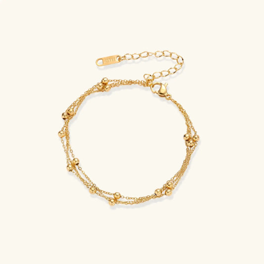 Golden Orbit Bracelet by Aurora Beauty