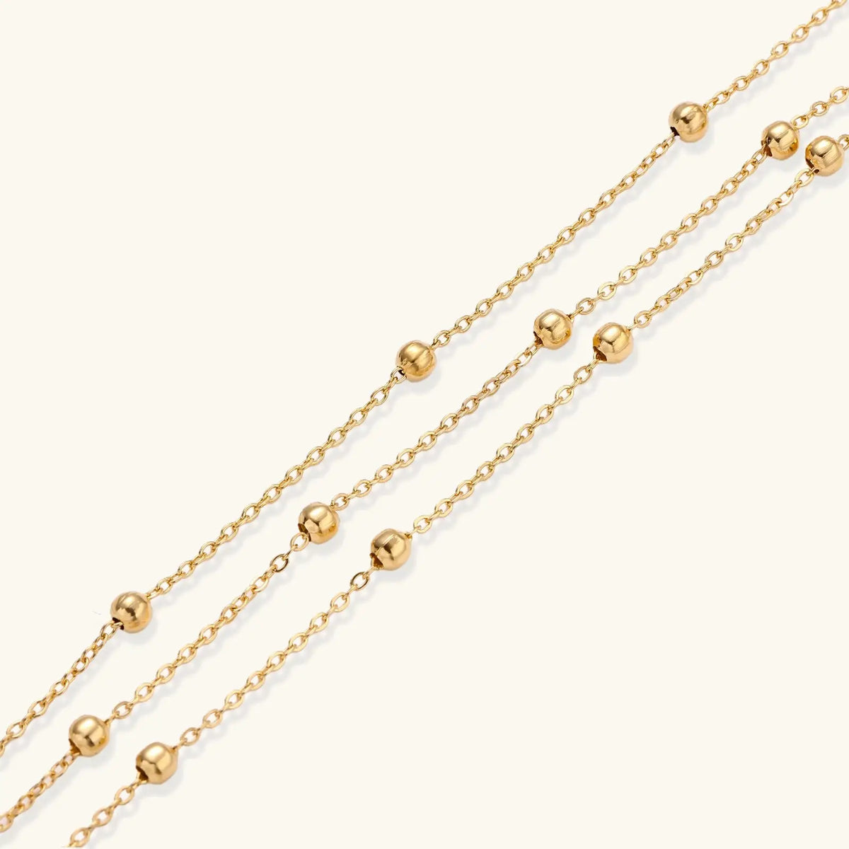 Golden Orbit Bracelet by Aurora Beauty