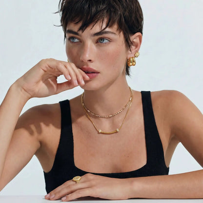 Curved Spark Bar Necklace by Aurora Beauty