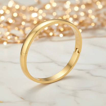 Bold Hinge Bangle by Aurora Beauty