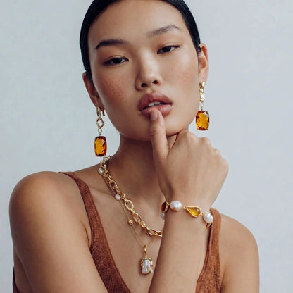 Golden Teardrop Bracelet by Aurora Beauty